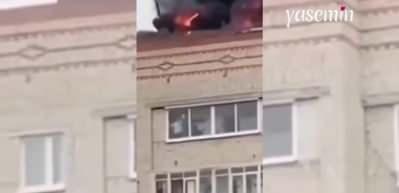 Evin çatısı yanarken cam silmeye devam etti! Kadını görenler hayrete düştü