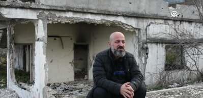  Suriye'de 14 yıl sonra k&ouml;y&uuml;ne kavuştu, evini mayınlarla &ccedil;evrili buldu