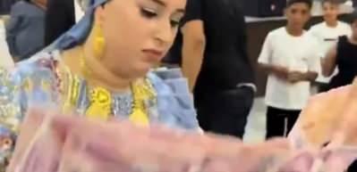 Aşiret düğününde valizden çıkan paralar gündem oldu! 200 banknotlardan yelek