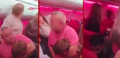 Antalya'dan kalktı, Br&uuml;ksel Havalimanı'na acil iniş yaptı! 2 yolcunun kavga anları kamerada