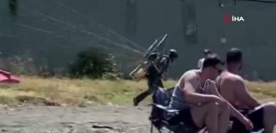 Plajda kontrolden &ccedil;ıkan motorlu paraş&uuml;t kalabalığa daldı: 3 yaralı