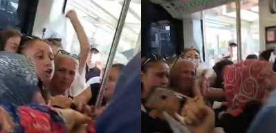 Tramvayda '&Ccedil;ocuklar kalksın' kavgasında ortalık karıştı