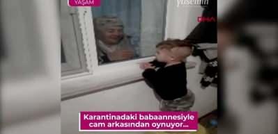 Y&uuml;rek yakan fotoğraf! Koronavir&uuml;s'e yakalanan babaannesiyle pencereden g&ouml;r&uuml;şebiliyor