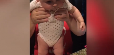İsko&ccedil; m&uuml;ziğinde &ccedil;ılgınlar gibi oynayan bebek