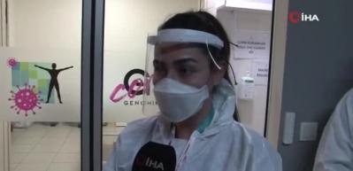 Korona vir&uuml;s tanı merkezinin g&ouml;n&uuml;ll&uuml; savaş&ccedil;ıları ilk kez g&ouml;r&uuml;nt&uuml;lendi