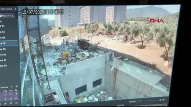 Aydın'da fakülte inşaatında iskelede çalışan işçinin düştüğü anın güvenlik kamerası görüntüsü.