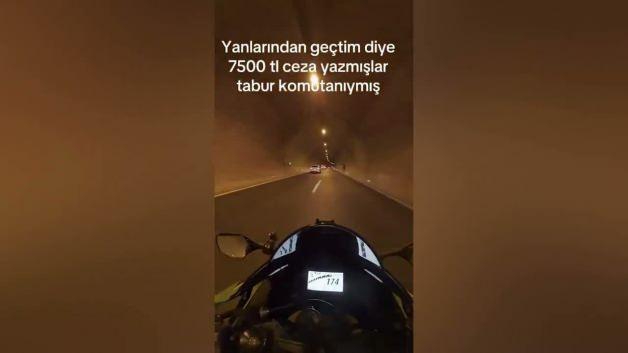 Motosiklet sürücüsünün tünelde hız yaparken çekilmiş görüntüsü.