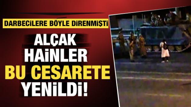 15 Temmuz darbe girişimi gecesi darbeci askerlerin üzerine yürüyen bir kadının fotoğrafı.