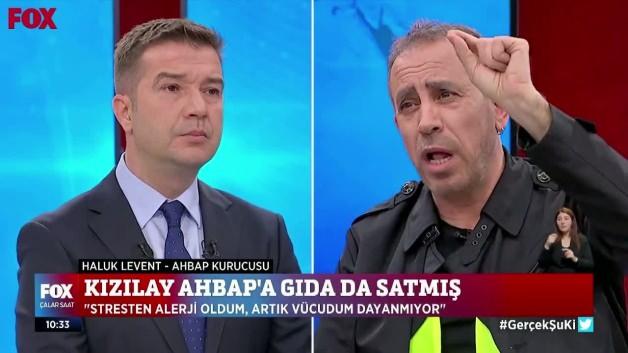 Haluk Levent'in Ahbap Derneği'ndeki faaliyetleriyle ilgili soruşturma kapsamında gözaltına alınmasını gösteren görsel.
