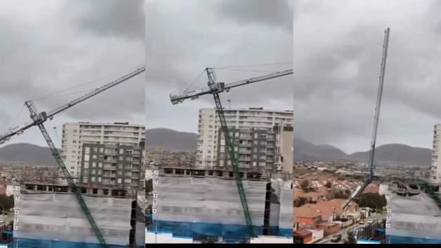 Şili'nin Coquimbo kentinde bir inşaat projesinde kullanılan kule vinç, çevredeki evlerin üzerine devrildi.