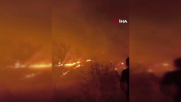 Diyarbakır'ın Kulp ilçesinde çıkan orman yangınında alevler yerleşim yerlerine doğru ilerliyor.
