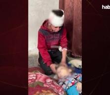 Yürek dağlayan veda: Gazzeli çocuk, hava saldırısında hayatını kaybeden kardeşiyle helalleşti