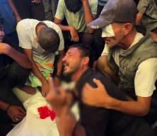İsrail'in yardım bekleyen Filistinlilerin üzerine açtığı ateşte yaşamını yitirenler son yolculuklarına uğurlandı.