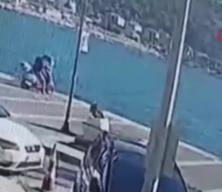 Yanlışlıkla gaza basan motosikletli denize uçtu