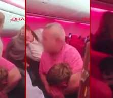 Antalya'dan kalktı, Br&uuml;ksel Havalimanı'na acil iniş yaptı! 2 yolcunun kavga anları kamerada