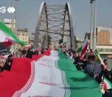 İran halkı n&ouml;bette: K&ouml;pr&uuml; ve santrallerde insan zinciri