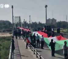 İran halkı n&ouml;bette: K&ouml;pr&uuml; ve santrallerde insan zinciri