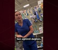Tesett&uuml;rl&uuml; kadını markette g&ouml;r&uuml;nce g&ouml;z&uuml; d&ouml;nd&uuml;: İslam'a dil uzattı