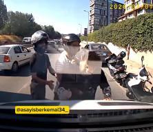 İstanbul'da trafik ter&ouml;r&uuml;: Motorcu s&uuml;r&uuml;c&uuml;n&uuml;n &uuml;zerine y&uuml;r&uuml;y&uuml;p araca saldırdı!