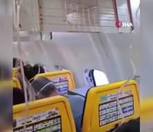 U&ccedil;akta dehşet! Pencere koptu, dışarı &ccedil;ekilen yolcu bacağından tutarak kurtarıldı