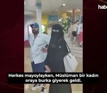 &Ccedil;arşaflı kadına &ccedil;irkin saldırı! 'Kıyafetin &ccedil;ocuklarımı korkutuyor'