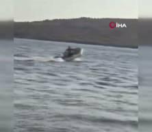 Ayvalık'ta can pazarı: Akıntıya kapılan tatilciyi botla kurtardı! 