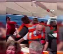 Girne a&ccedil;ıklarında alabora olan yolcu gemisindeki yolcuları kurtarma &ccedil;alışmaları kameralara yansıdı