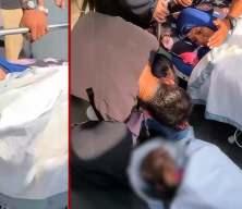 İsrail saldırısında yaralanan kadın hayatını kaybeden eşine sedyeden veda etti