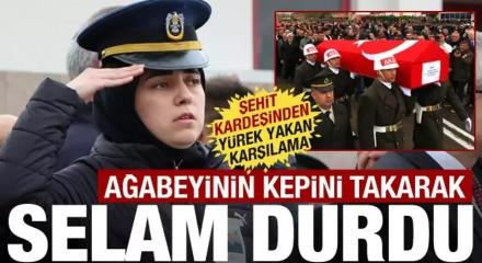 Polis olan kız kardeşi şehit ağabeyini asker selamıyla karşıladı