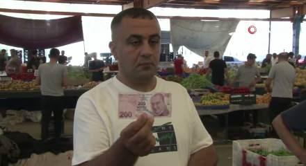 Adana'da bir garip olay! T&uuml;m pazar esnafına bu paraları dağıttı