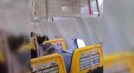 U&ccedil;akta dehşet! Pencere koptu, dışarı &ccedil;ekilen yolcu bacağından tutarak kurtarıldı