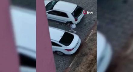 Karab&uuml;k'te &ouml;fke patlaması: Demir &ccedil;ubukla otomobilin camlarını tuzla buz etti