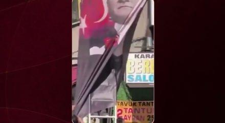 Yeni parti binasında Atat&uuml;rk posterindeki Altıok amblemine bı&ccedil;akla kestiler