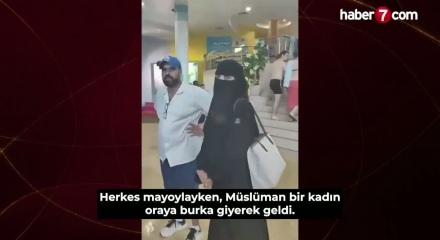 &Ccedil;arşaflı kadına &ccedil;irkin saldırı! 'Kıyafetin &ccedil;ocuklarımı korkutuyor'