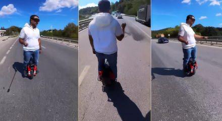 Trafikte akılalmaz anlar: Tek tekerlekli scooter ile tırların sağından ge&ccedil;ti
