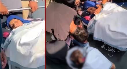 İsrail saldırısında yaralanan kadın hayatını kaybeden eşine sedyeden veda etti