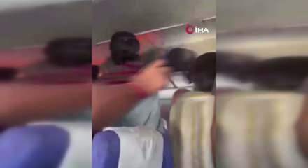 Hindistan'da yolcu u&ccedil;ağında yangın paniği! U&ccedil;ak acil iniş yaptı