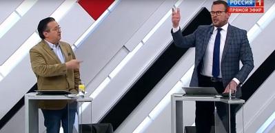 Ukraynalı akademisyen canlı yayında Amerikalı gazeteciye saldırdı