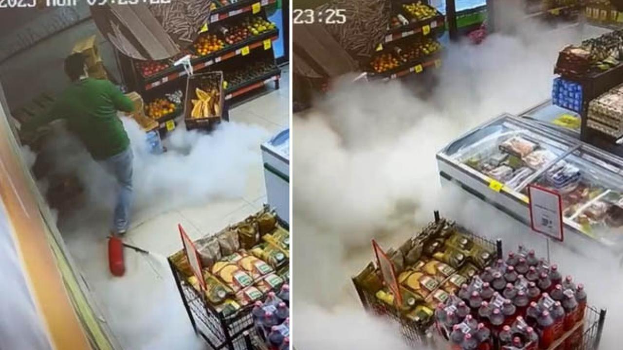 Markette yangın tüpü yere düşünce çalışan panikle kaçıştı