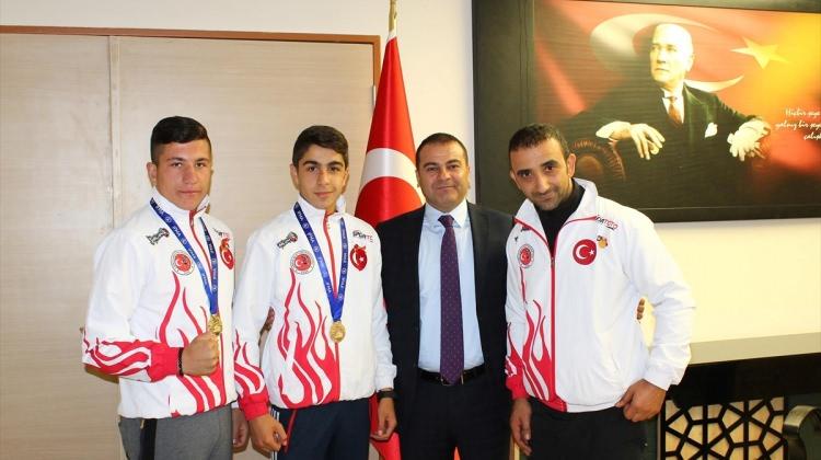 Şampiyon sporcular Kaymakam Yaşar'ı ziyaret etti
