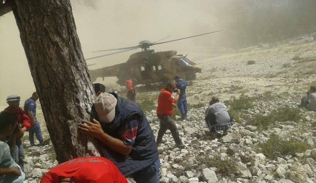 Kayalıklara düşen paraşütçü 20 saat sonra kurtarıldı