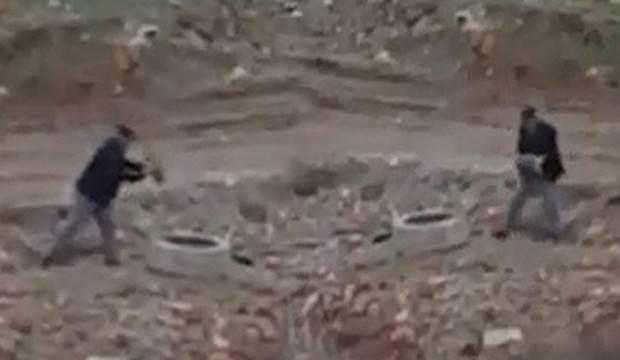 Skandal görüntü! Rögarı taşla doldurup…