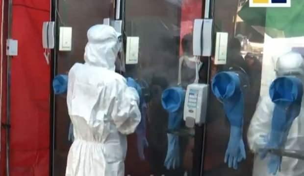 Virüs ile mücadelede dünyaya örnek oldular! Telefon kulübesinde korona testi