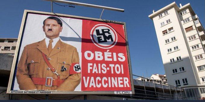 Macron'un Hitler'e benzetildiği afişi asana 10 bin euro ceza