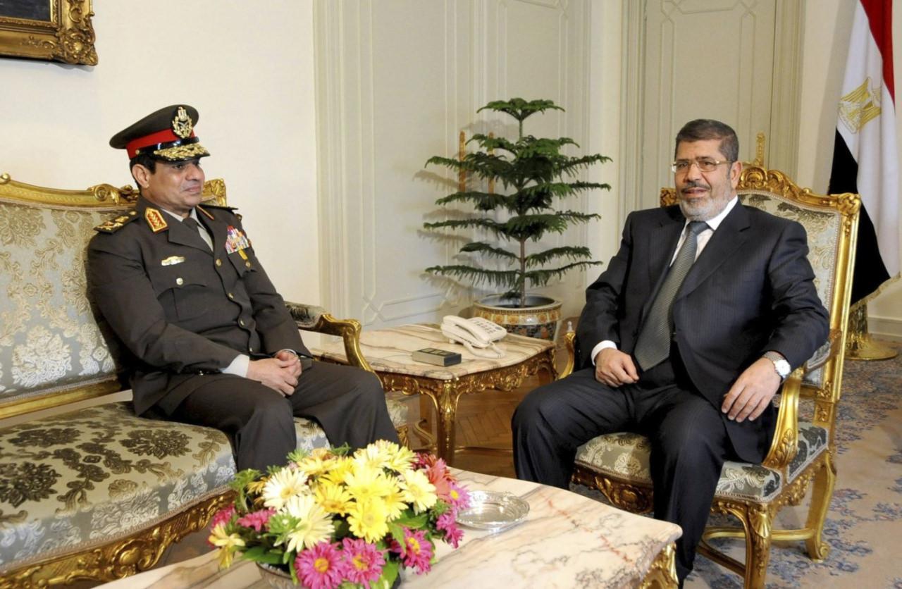 Abdulfettah es-Sisi ve Muhammed Mursi