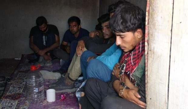 Evin kömürlüğünde 13 göçmen yakalandı