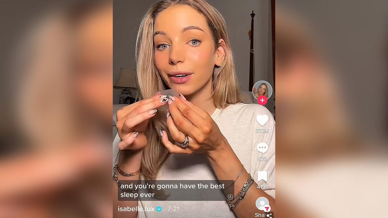 TikTok'un bir başka fenomeni Isabelle Lux da ağzını bantlayarak çektiği uykunun, hayatındaki en iyi uyku olduğunu iddia etti