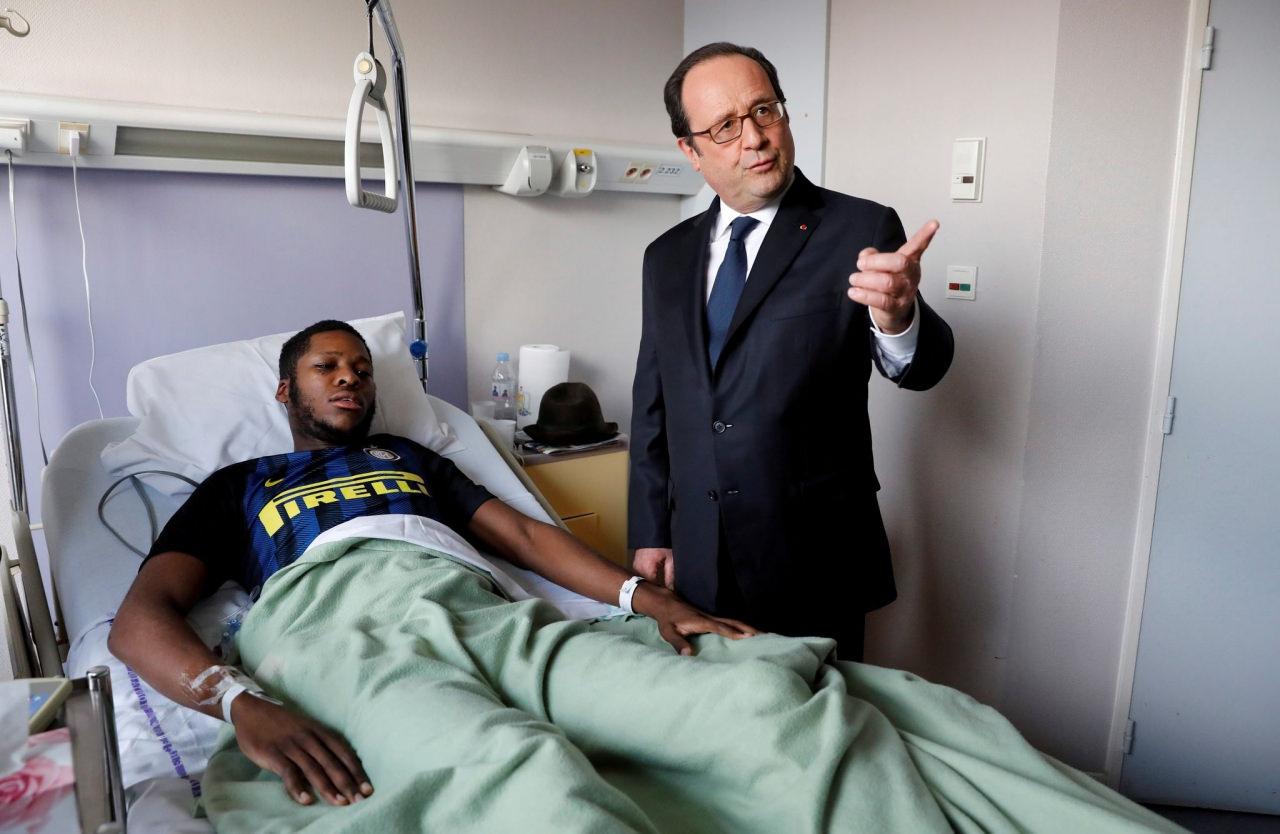 Theo Luhaka ve dönemin Cumhurbaşkanı François Hollande