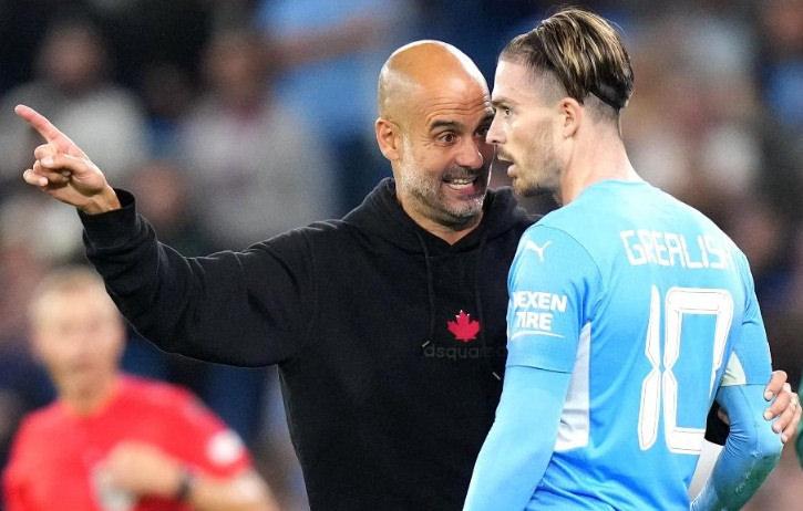 Pep Guardiola ve Jack Grealish