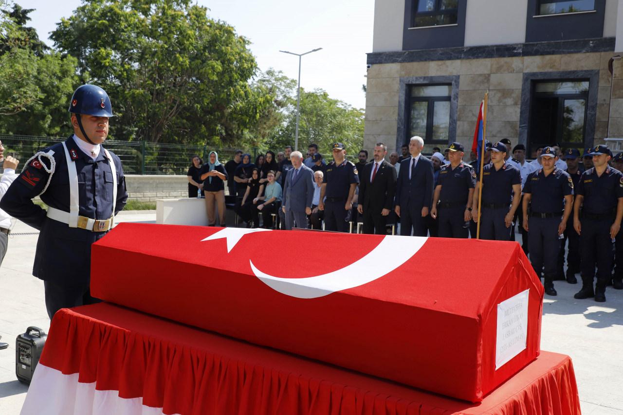 Özkan için tören düzenlendi.